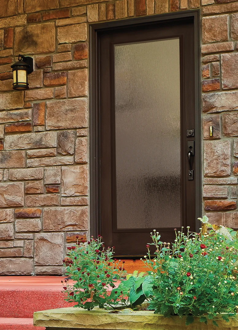 FULL LITE DOOR IN OAK GRAIN / MAHOGANY WITH RAIN PRIVACY GLASS. ADDISON HANDLESET AND DEADBOLT IN AGED BRONZE. FULL LITE DOOR IN OAK GRAIN / MAHOGANY WITH RAIN PRIVACY GLASS. ADDISON HANDLESET AND DEADBOLT IN AGED BRONZE.